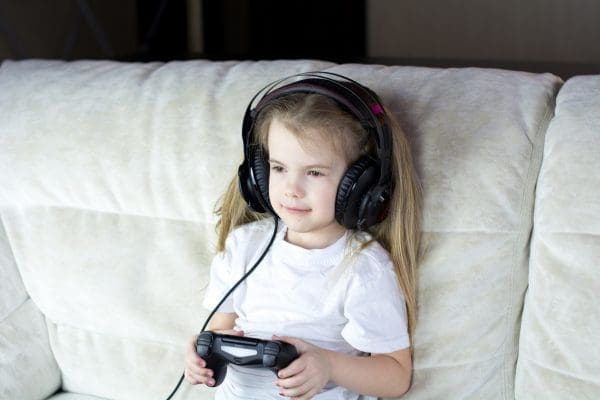 Tips for Keeping Your Child Safe Online: Little girl, headphones