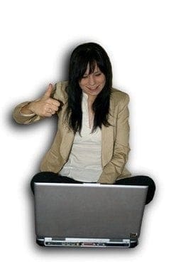 A woman working on a laptop, displaying excellent work-life balance.