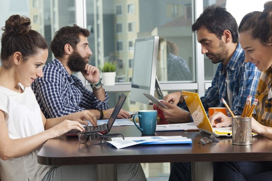 https://blog.invoiceberry.com/wp-content/uploads/2016/05/small_business_office_laptops-e1464097574482.jpeg